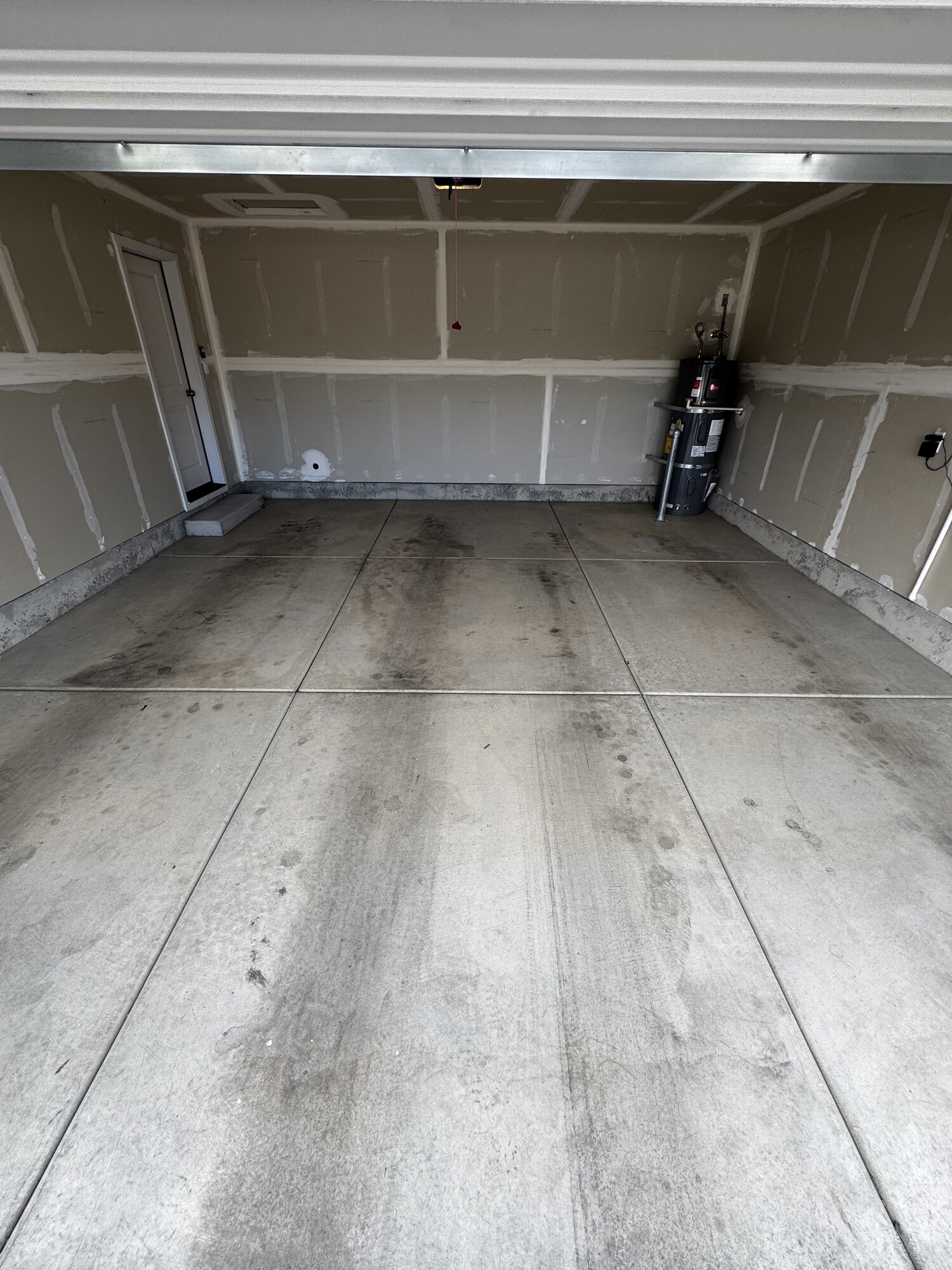 Bare Concrete to Silver Metallic Garage | before